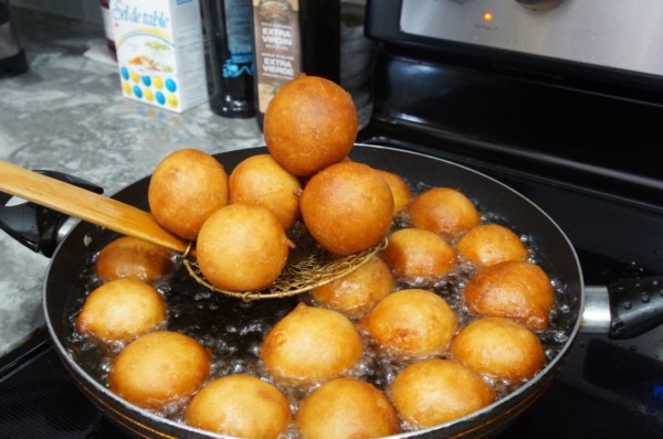 Nigerian puffpuff puff puff balls golden brown being fried recipe