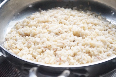 Boiling ofada brown rice