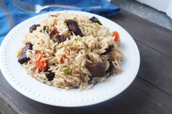 Nigerian coconut rice with fried meat